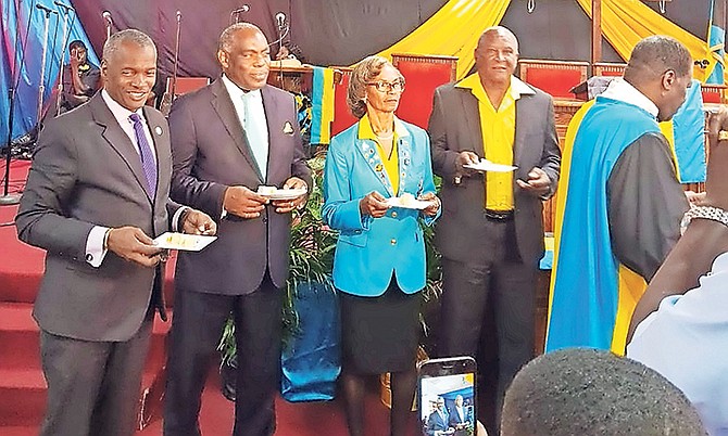 Commonwealth Baptist Church's Independence honourees Minister Desmond Bannister, journalist Wendell Jones and coaches Hattie Moxey and Anthony Swaby. Pastor Bishop Arnold Josey is shown at right.