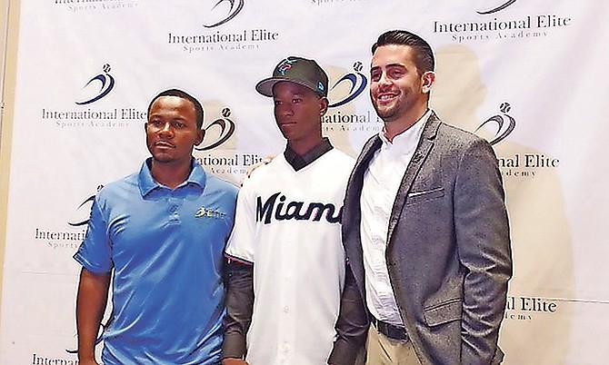 SHOWN (l-r) are Geron Sands, director of International Elite Sports Academy, Ian Lewis and Adrian Lorenzo, Marlins’ special assistant of Baseball Operations.