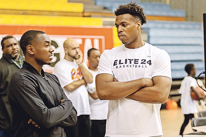 LOURAWLS “Tum Tum” Nairn Jr, left, talks with Chavano “Buddy” Hield at the Hope 24 Elite Buddy Hield Basketball Clinic.