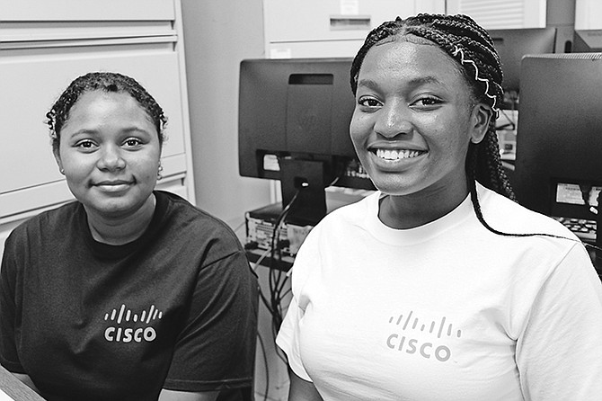 Queen’s College student Danille Isaacs, left, and St John’s College student Kaitlyn Micklewhite were two of the girls chosen from the government’s three-year Information and Communications Technology programme to participate in a one-day Girls Power Tech conference sponsored by tech giant, Cisco. The Bahamas Technical and Vocational Institute (BTVI) is facilitator of the ICT programme. Photo: BTVI