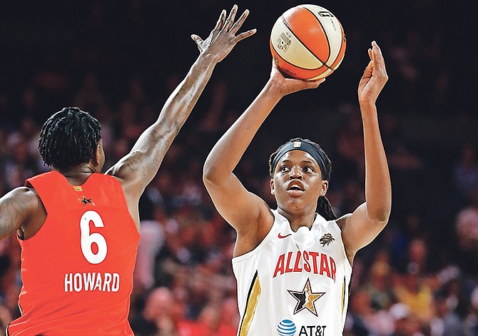 Connecticut Sun’s Jonquel Jones, of Team Delle Donne, shoots over Seattle Storm’s Natasha Howard, of Team Wilson, during the first half of the WNBA All-Star game on Saturday in Las Vegas.

(AP Photo/John Locher)
