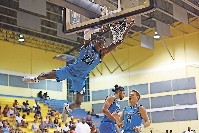 ON THE REPLAY: The Georgetown Hoyas opened their appearance in the Bahamas Basketball Federation’s Summer of Thunder basketball tournament with a 103-77 rout of the Commonwealth Bank Giants at the Kendal Isaacs Gymnasium yesterday. 
Photos: Shawn Hanna/Tribune Staff