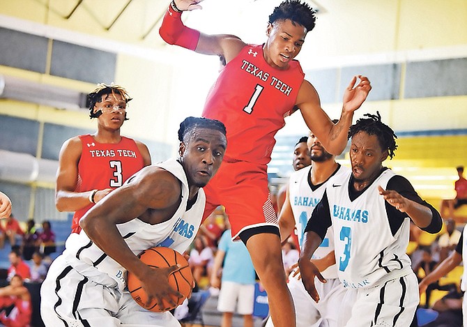 OUR men’s national basketball team pulled off a 63-57 victory last night over the Texas Tech Red Raiders in the Bahamas Basketball Federation’s Summer of Thunder tournament at the Kendal Isaacs Gymnasium.  
Photo: Shawn Hanna/Tribune Staff