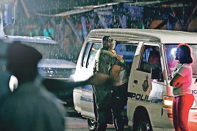 The scene at Potter's Cay Dock after the double shooting. Photo: Shawn Hanna/Tribune staff