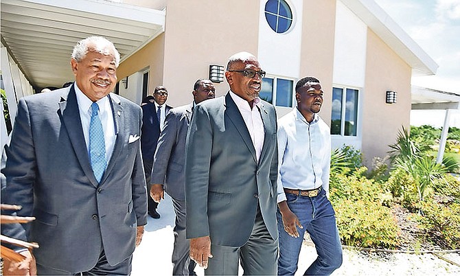 Prime Minister Dr Hubert Minnis and Bain Town MP Travis Robinson conducted a walkabout of the University of The Bahamas with UB president Dr Rodney Smith. Photo: Shawn Hanna/Tribune Staff
