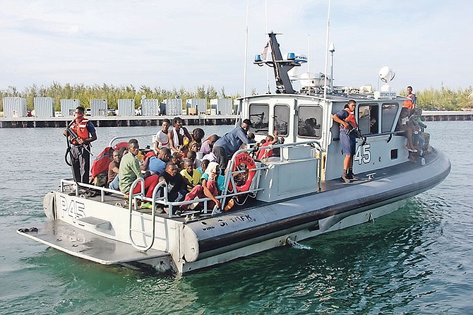 Haitian migrants entering the RBDF Base aboard patrol craft P-45. Photo: Chief Petty Officer Jonathan Rolle