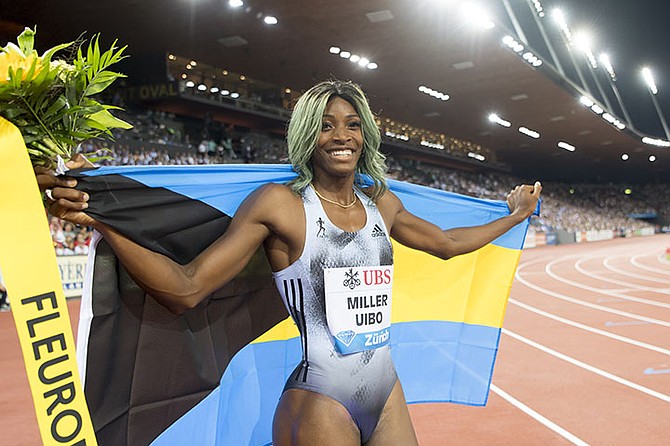 Shaunae Miller-Uibo reacts after winning the women's 200m race, during the Weltklasse IAAF Diamond League international athletics meeting in the stadium Letzigrund in Zurich, Switzerland, Thursday. (Jean-Christophe Bott/Keystone via AP)