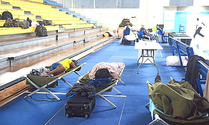 Residents taking shelter in Kendal Isaacs Gym. Photo: Shawn Hanna/Tribune staff