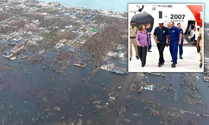 Prime Minister Dr Hubert Minnis returns (inset)) from a flight to Abaco to assess the damage. 
Inset Photo: Yontalay Bowe