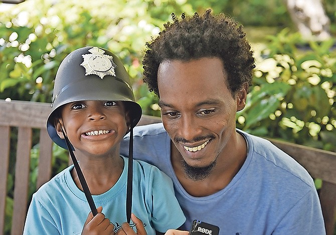 Jovan Cambridge Sr. and his son Jovan Cambridge Jr. Photo: Shawn Hanna/Tribune Staff