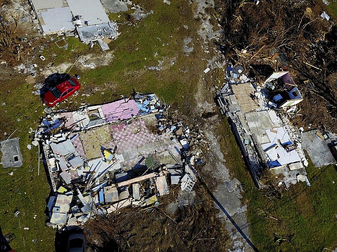 A house lays shattered, destroyed by Hurricane Dorian, in High Rock, Grand Bahama. (AP Photo/Ramon Espinosa)