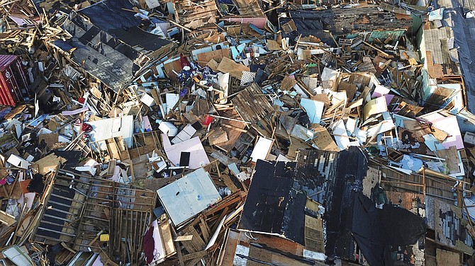 Homes in ruins one week after Hurricane Dorian hit The Mudd community in Abaco. (AP Photo/Fernando Llano)