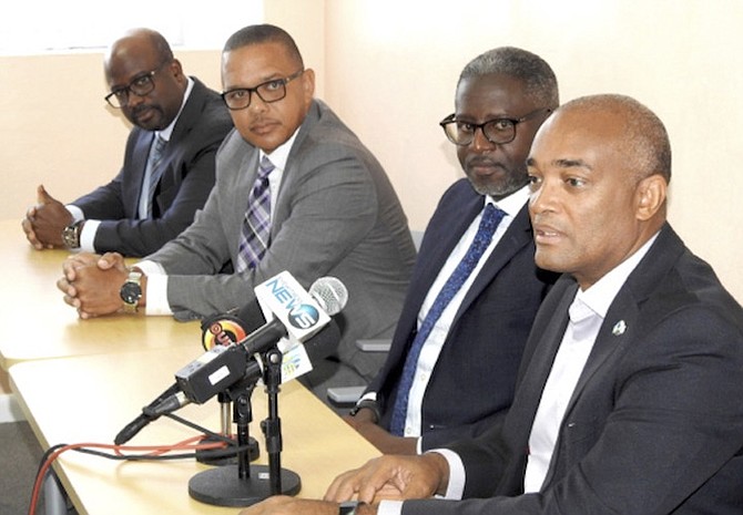 L-R: Patrick Ward, president, Bahamas First; Glen Ritchie, president, Family Guardian; Warren Rolle, BIA chairman; Timothy Ingraham, president, Summit Insurance.