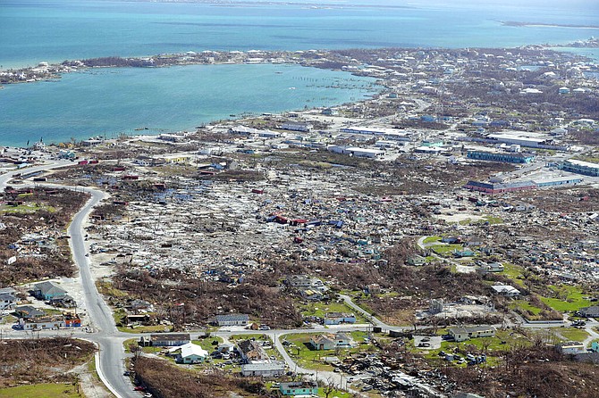 In this photo by the Dutch Defence Ministry taken on Wednesday, the aftermath of Hurricane Dorian is seen on the island of Abaco. Two Dutch navy ships have arrived in the Bahamas to help with the relief operation after the region was devastated by Hurricane Dorian. The Defence Ministry says that around 550 military personnel who arrived Wednesday on board the ships Snellius and Johan de Witt will deliver aid to residents on Abaco. (Sjoerd Hilckmann/Dutch Defense Ministry via AP)