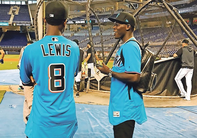 Jazz Chisholm, right, and Ian Lewis, were on hand at Marlins Park Tuesday to assist in a relief drive by the club for Hurricane Dorian victims during their game against the Milwaukee Brewers.