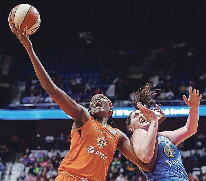 Connecticut Sun centre Jonquel Jones beats Chicago Sky centre Stefanie Dolson to a rebound last week Friday. (AP)