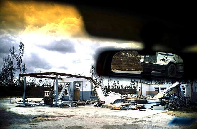 A shattered gas station is seen at the aftermath of Hurricane Dorian in Freetown, Grand Bahama, Friday. (AP Photo/Ramon Espinosa)
