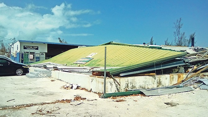 The collapsed Prestige Auto Car showroom in Grand Bahama.