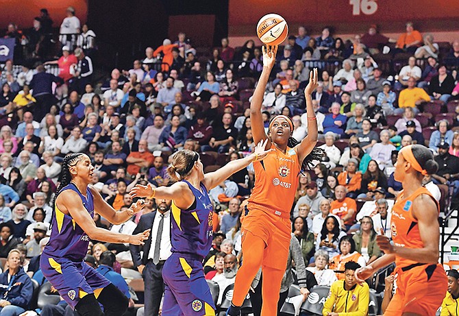 Connecticut Sun’s Jonquel Jones shoots over Los Angeles Sparks’ Sydney Wiese during the second half of Game 2 of their WNBA semi-finals game 2 last night in Uncasville, Connecticut.

(AP Photo/Jessica Hill)
