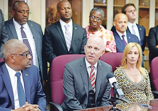 Prime Minister Dr Hubert Minnis alongside investor Michael Wiener at the heads of agreement signing at Cabinet Office last year for the 4M Harbour Island Ltd project.

Photo: Shawn Hanna/Tribune Staff