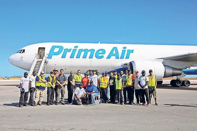 An Amazon Air flight arrives at Grand Bahama International Airport, bringing supplies to assist the Grand Bahama Disaster Relief Foundation.