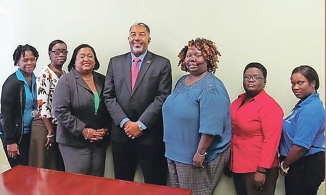 Minister of Social Services Frankie Campbell with the Abaco team.
