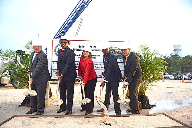 AT the groundbreaking, from left, are: Addison Davis, Director of the Bureau of Overseas Buildings Operations; Prime Minister Dr Hubert Minnis; Stephanie Bowers, Charge D’Affaires; Darren Henfield, Minister of Foreign Affairs and Jim Schaefer, American Chamber of Commerce of The Bahamas President. Photos: Shawn Hanna/Tribune Staff