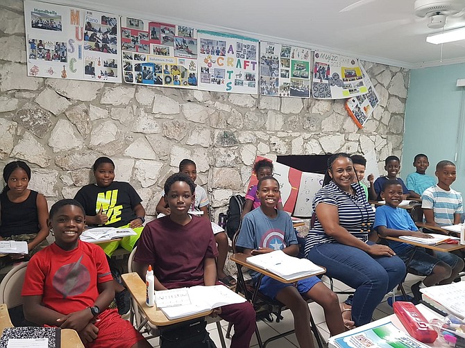GB Teacher Autumn Wildgoose of Hugh Campbell Primary holds classes for her students at the Allegra School of Music after the school was severely damaged during Hurricane Dorian.
