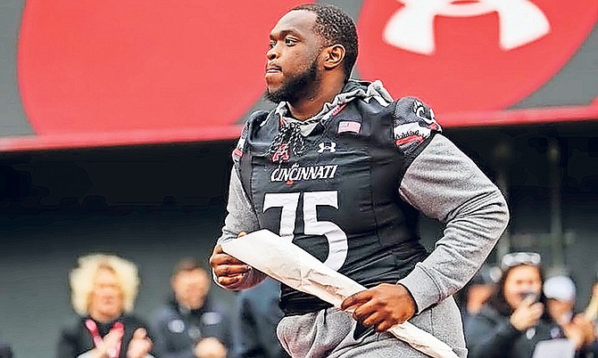 CHRIS Ferguson and the Cincinnati Bearcats are now ranked No.21 in both the Associated Press Top 25 and the Amway Coaches Poll.