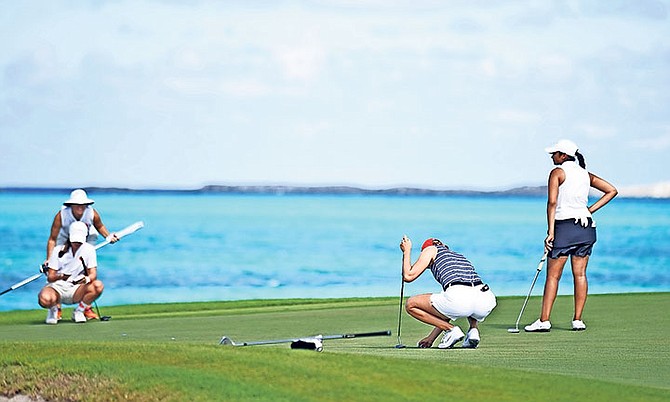 GOLFERS compete in the White Sands Invitational at the Ocean Club Golf Course.

Photo: Shawn Hanna/Tribune Staff