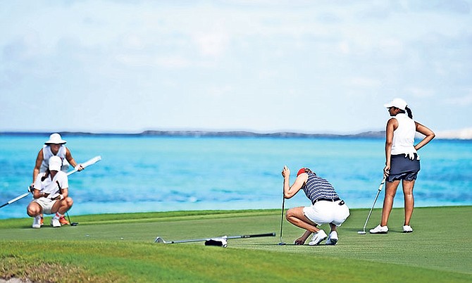 GOLFERS compete in the White Sands Invitational at the Ocean Club Golf Course.

Photo: Shawn Hanna/Tribune Staff