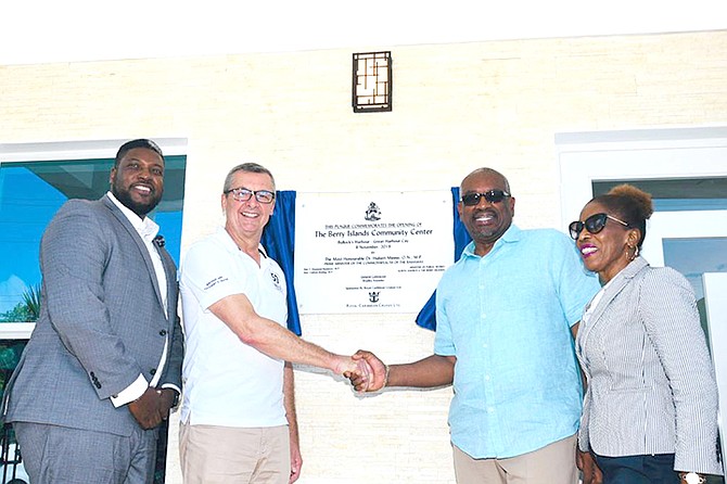 President and CEO of Royal Caribbean International Michael Bayley shakes hands with Prime Minister Dr Hubert Minnis at the opening of the Berry Islands Community Centre.
(BIS Photos/Yontalay Bowe)