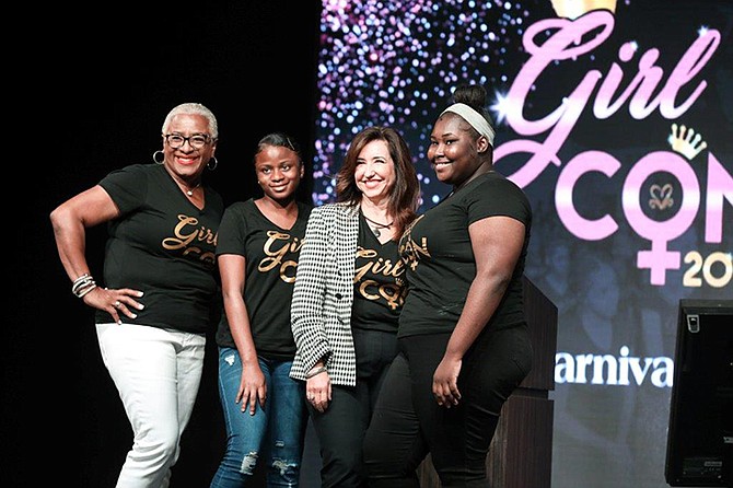 Christine Duffy, second right, president of Carnival Cruise Line with Senate President Katherine Smith, left, founder of Girl Con, and two participants