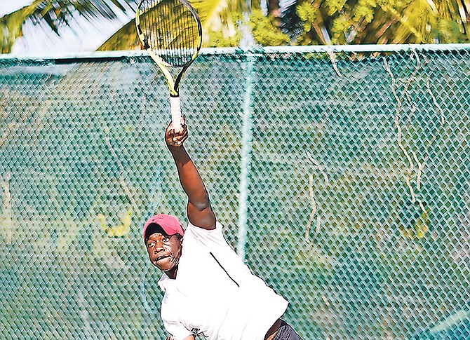 POWER PLAY: Donte Armbrister in action yesterday against Shu Matsuoka, of Japan, in the boys’ quarter-final of the Bahamas Lawn Tennis Association’s International Tennis Federation Goombay Splash at the National Tennis Centre.

Photo by Terrel W Carey Sr/Tribune Staff