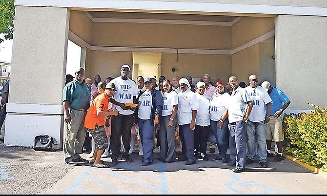 Disgruntled hotel workers are pictured at the Department of Labour after picketing at Atlantis resort yesterday morning. Photo: Shawn Hanna/Tribune staff