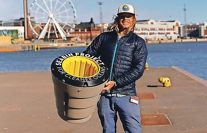 Pete Ceglinski, Seabin co-founder and CEO, holding an ocean plastic removal device © Seabin