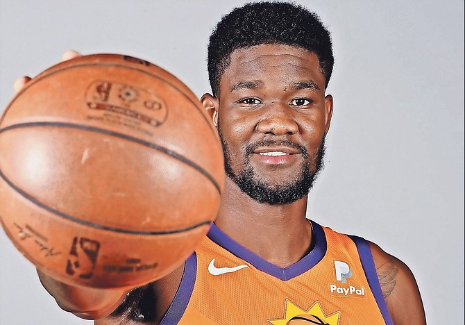 Phoenix Suns’ DeAndre Ayton poses for photographs during media day at the NBA basketball team’s practice facility on September 30 in Phoenix. Ayton will complete his 25-game suspension following the Suns’ December 16 contest against the Portland Trail Blazers and is eligible to return December 17 on the road against the Los Angeles Clippers.
 (AP Photos/Matt York)