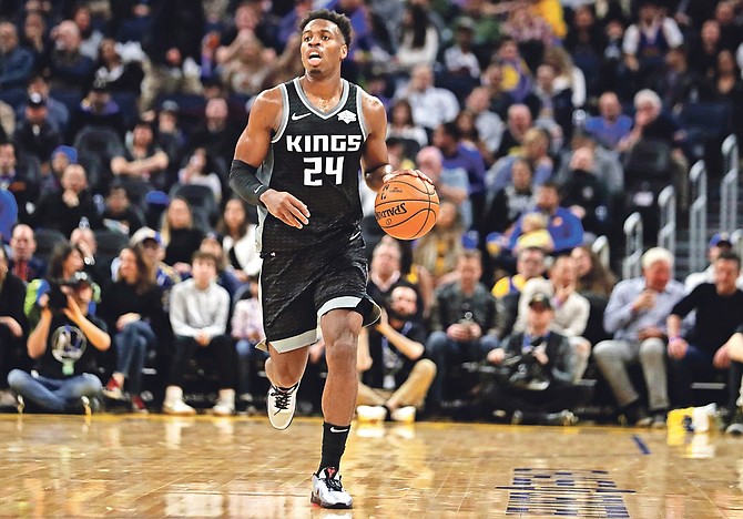 Sacramento Kings guard Buddy Hield (24) drives against the Golden State Warriors during the second half in San Francisco on Sunday.
(AP Photos/Jed Jacobsohn)