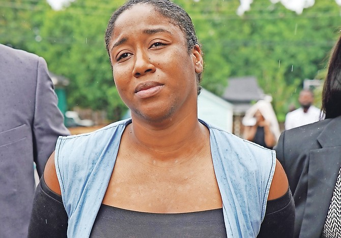 De’Edra Michelle Gibson outside court on Thursday. 
Photo: Terrel W Carey Sr/Tribune Staff