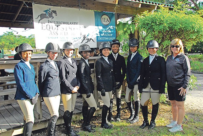 Eight riders participated in the Selection Trials to represent Team Bahamas in the first ever IEA International Invitational. Shown (l-r) are Hannah D’Aguilar, Peyton Wong, Elle O’Brien, Alexis Neymour, Taylor Haines, Nicholas Astwood, Mila Sands and Maya Tilberg with Roxane Durant, president and co-founder of the US-based Interscholastic Equestrian Association (IEA).