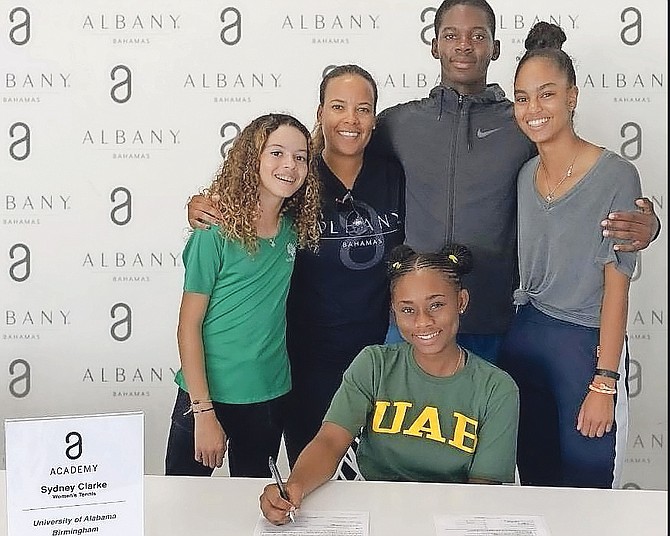 Syndey Clarke in flanked by Madison Seivright, coach Richele LeSaldo, Jacobi Bain and Isabella Saul at Albany as she signed her letter of intent for UAB.