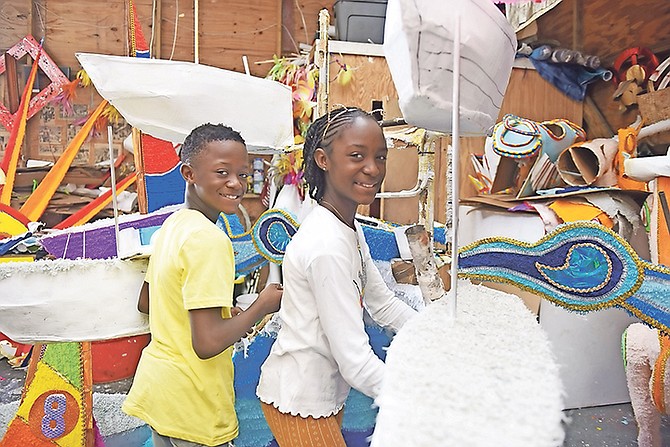 Teran and Teron Davis from One Family are seen making final preparations yesterday for this years’s Junkanoo parades.
Photos: Shawn Hanna/Tribune Staff