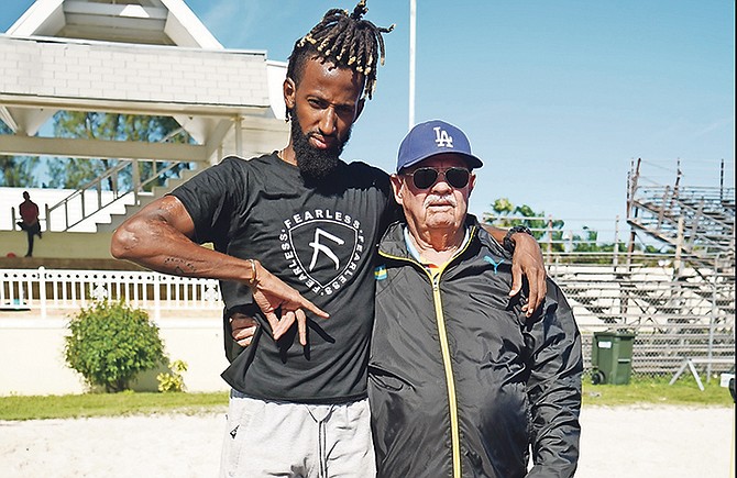 Jamal Wilson and coach Ronald Cartwright.