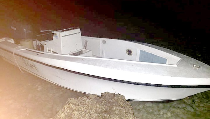 The suspects were boarding this white 25-30ft open hull vessel.