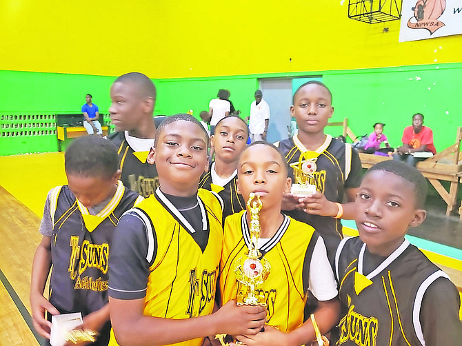 Temple Christian Suns' under-12 boys with their trophies