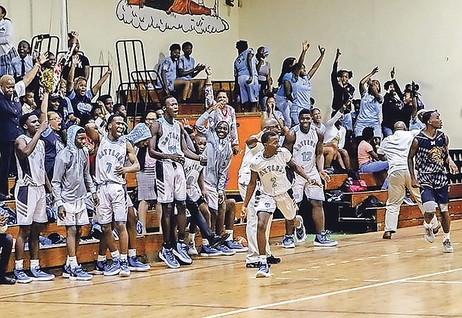 ON THE REPLAY: The CI Gibson Rattlers bench celebrates a three pointer from Kenvon Farrington (No.2) in their 75-60 win over the Doris Johnson Mystic Marlins.                                                                                                    Photo: 10th Year Seniors
