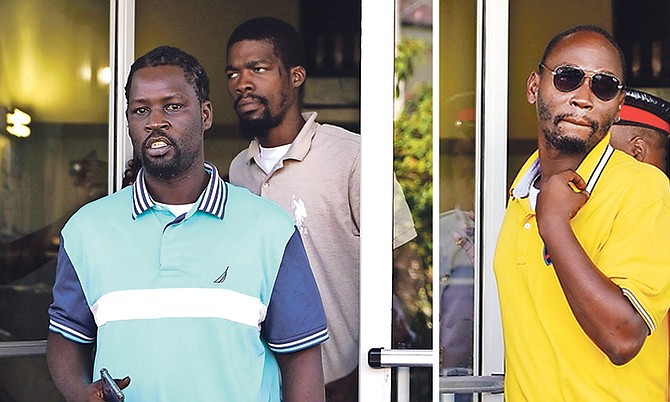 The three accused, from left: Jermaine Curry and, behind him, Justin Williams. Right: Peter Rolle. 
Photos: Terrel W Carey Sr/Tribune staff