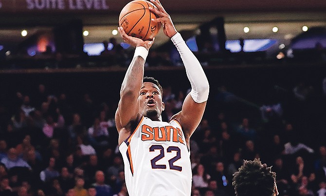 Phoenix Suns centre Deandre Ayton (22) shoots during the second half against the New York Knicks on January 16. The Suns defeated the Knicks 121-98.

(AP Photo/Kathy Willens)