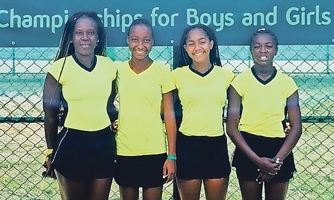 Coach Marion Rolle with players Sierra Rodgers, Sapphire Ferguson and BreAnn Ferguson.