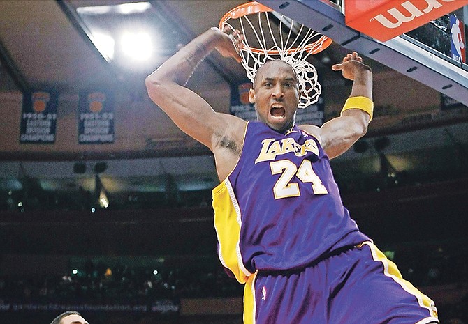 Los Angeles Lakers guard Kobe Bryant (24) reacts after a slam dunk shot in the first half of an NBA basketball game at Madison Square Garden in New York on February 2, 2009. (AP)